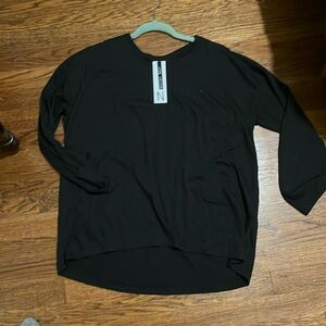 Noisy may brand loose fitting black T-shirt. Long sleeve